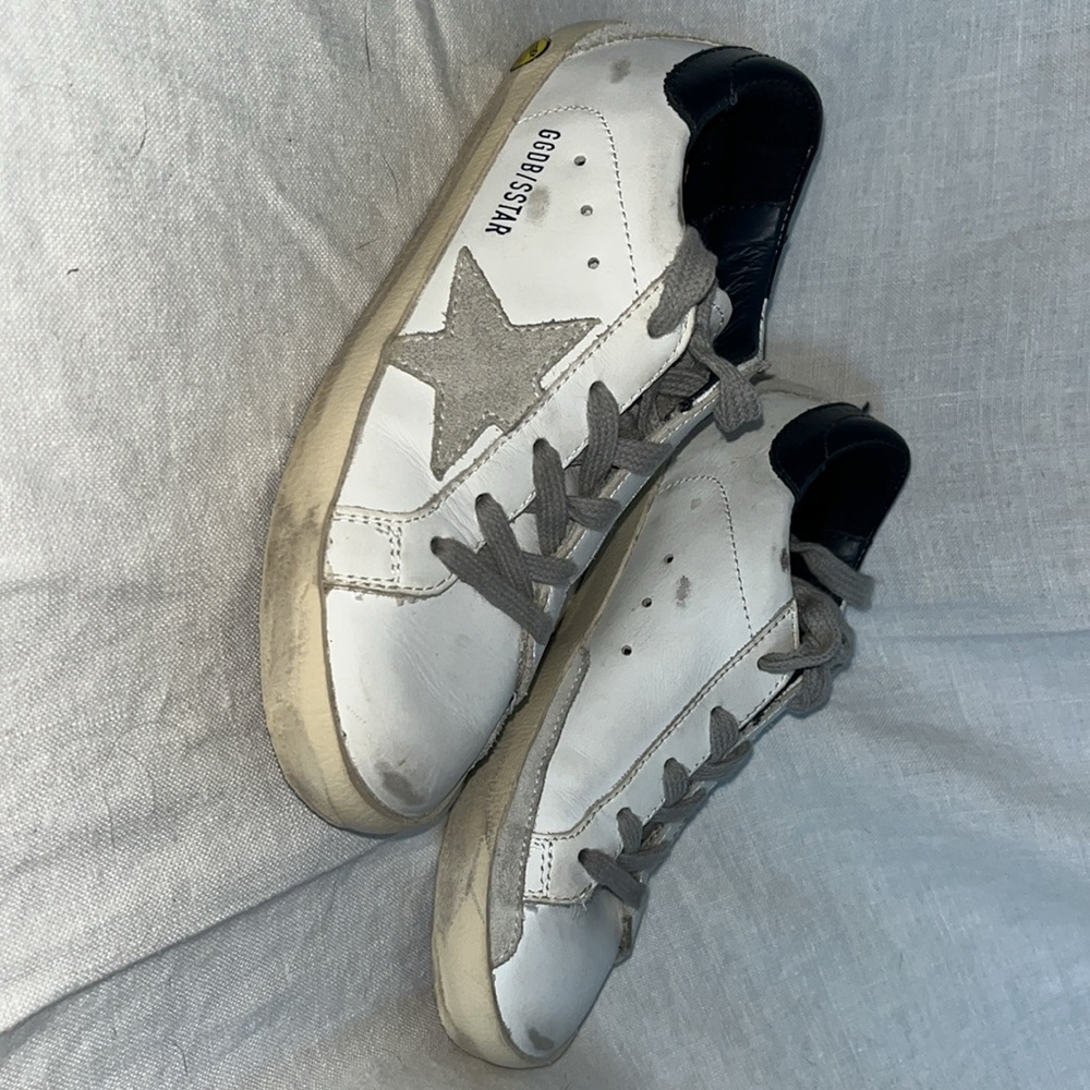 Golden Goose girls tennis shoes size 1, worn 2 or 3 x’s. White with silver stars
